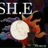 SH.E