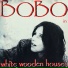 Bobo in withe wooden houses