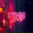SYMN.